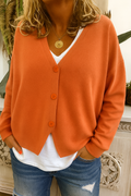 Women's plain knit V-neck cardigan with long sleeves and button fastening