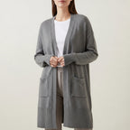 Women's long open-front cardigan with patch pockets and ribbed trims