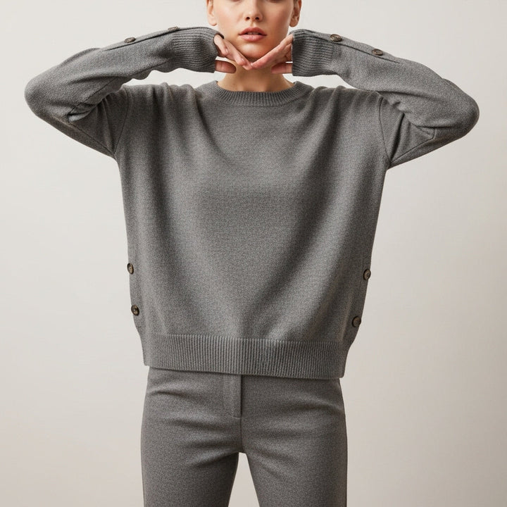 Women's long sleeve crew neck sweater with button details