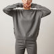 Women's long sleeve crew neck sweater with button details