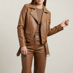 Women's long-sleeve leather biker jacket with notched collar and zip pockets