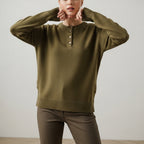 Women's long sleeve crew neck sweater with button details