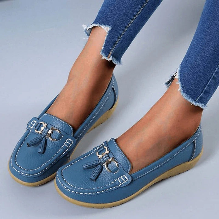 Women's loafers with tassels and metal bit details