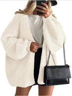 Women's oversized open-front knitted cardigan with long lantern sleeves