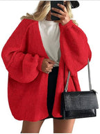 Women's oversized open-front knitted cardigan with long lantern sleeves