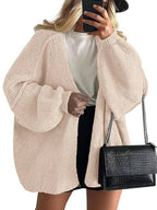Women's oversized open-front knitted cardigan with long lantern sleeves