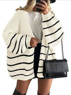 Women's oversized open-front knitted cardigan with long lantern sleeves