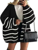 Women's oversized open-front knitted cardigan with long lantern sleeves