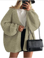 Women's oversized open-front knitted cardigan with long lantern sleeves