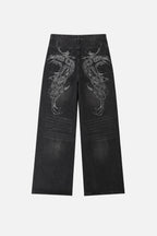 Men's black wide-leg jeans with graphic back pockets and gathered hems