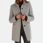 Women's longline coat with high collar, button front and patch pockets