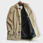 Men's collared waterproof trench coat with button fastening
