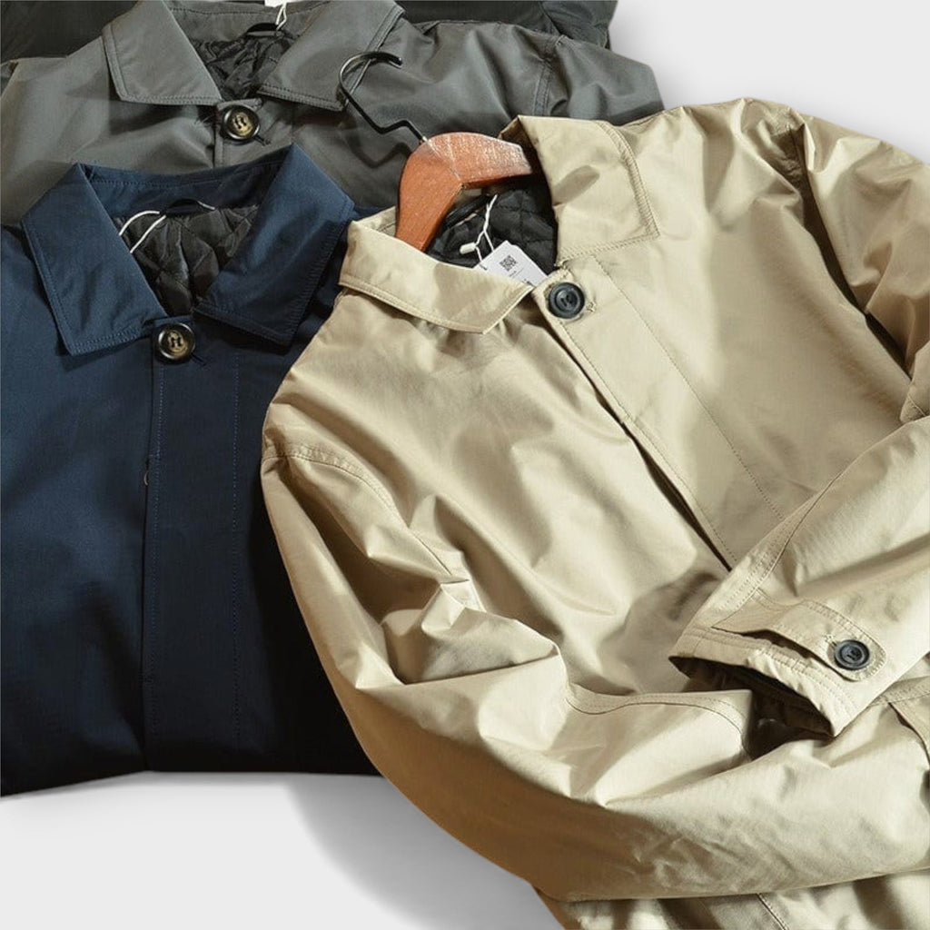 Men's collared waterproof trench coat with button fastening