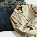 Men's collared waterproof trench coat with button fastening