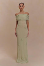 Women's off-shoulder knit maxi dress with decorative rosettes