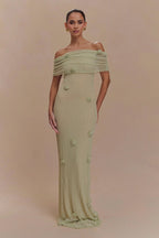 Women's off-shoulder knit maxi dress with decorative rosettes