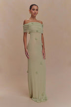 Women's off-shoulder knit maxi dress with decorative rosettes