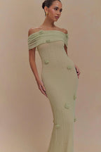 Women's off-shoulder knit maxi dress with decorative rosettes