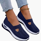 Women's textured slip-on sneakers with round toes and low soles