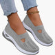 Women's textured slip-on sneakers with round toes and low soles