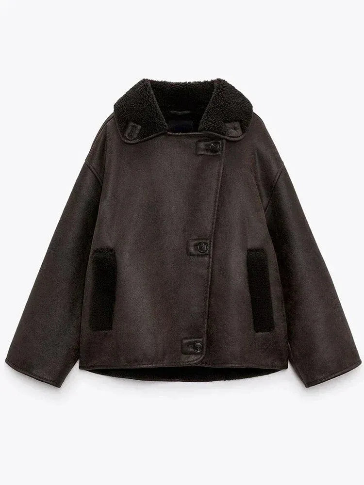 Women's brown oversized aviator jacket with wide dark collar and textured cuffs
