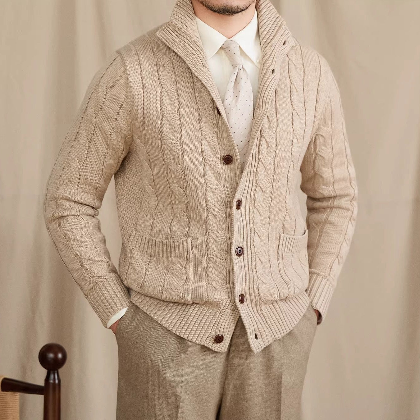 Men's cable knit cardigan with shawl collar and button front