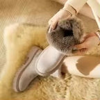 Fur-trimmed winter boots with side zipper and lug sole
