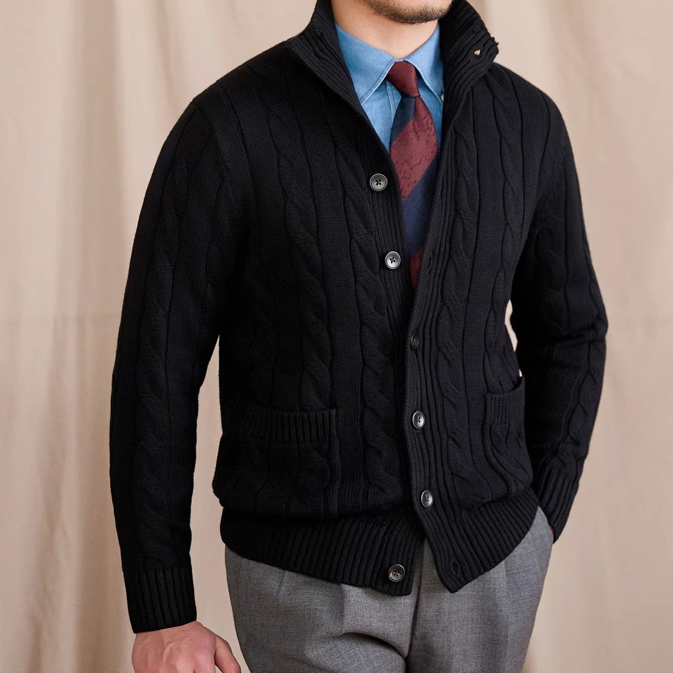 Men's cable knit cardigan with shawl collar and button front
