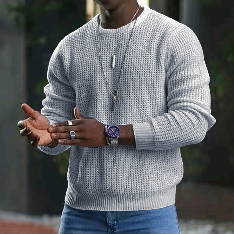 Men's textured knit sweater with crew neckline and long sleeves