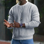 Men's textured knit sweater with crew neckline and long sleeves