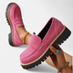 Women's penny loafers with lug sole, rounded toe and vamp strap