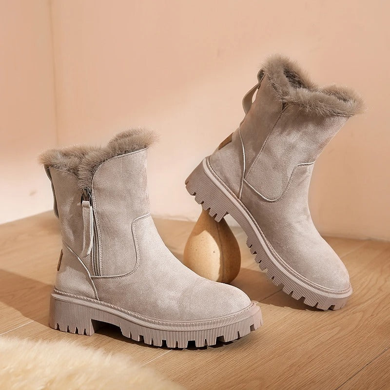 Fur-trimmed winter boots with side zipper and lug sole