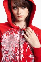 Women's red cropped hoodie with white and grey graphic print, hood and zip front