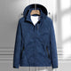 Women's hooded leaf pattern rain jacket with long sleeves and zipped pockets