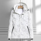 Women's hooded leaf pattern rain jacket with long sleeves and zipped pockets