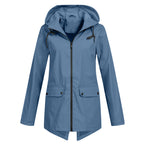 Women's longline hooded raincoat with zip front and flap pockets