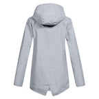 Women's longline hooded raincoat with zip front and flap pockets