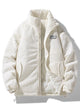 Ribbed padded jacket with stand collar, long sleeves and front zip