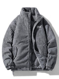 Ribbed padded jacket with stand collar, long sleeves and front zip