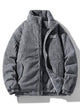 Ribbed padded jacket with stand collar, long sleeves and front zip