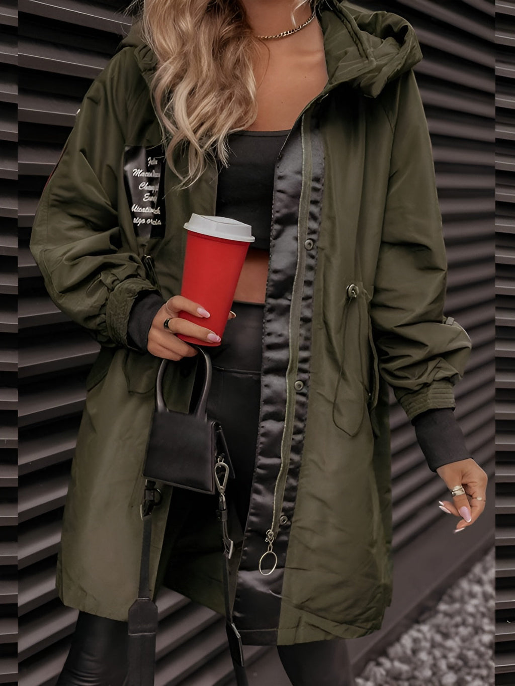 Women's oversized hooded windbreaker jacket with front pockets