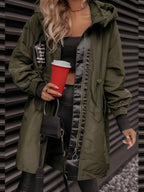 Women's oversized hooded windbreaker jacket with front pockets