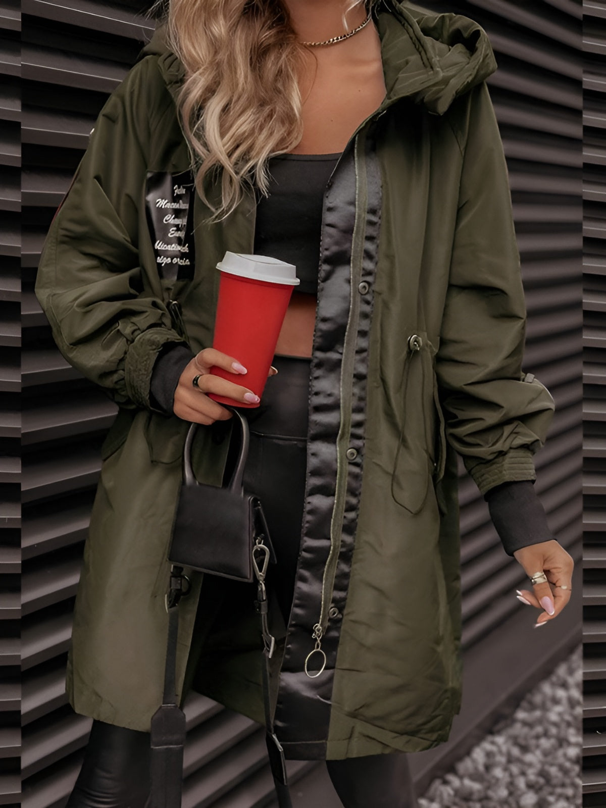 Women's oversized hooded windbreaker jacket with front pockets
