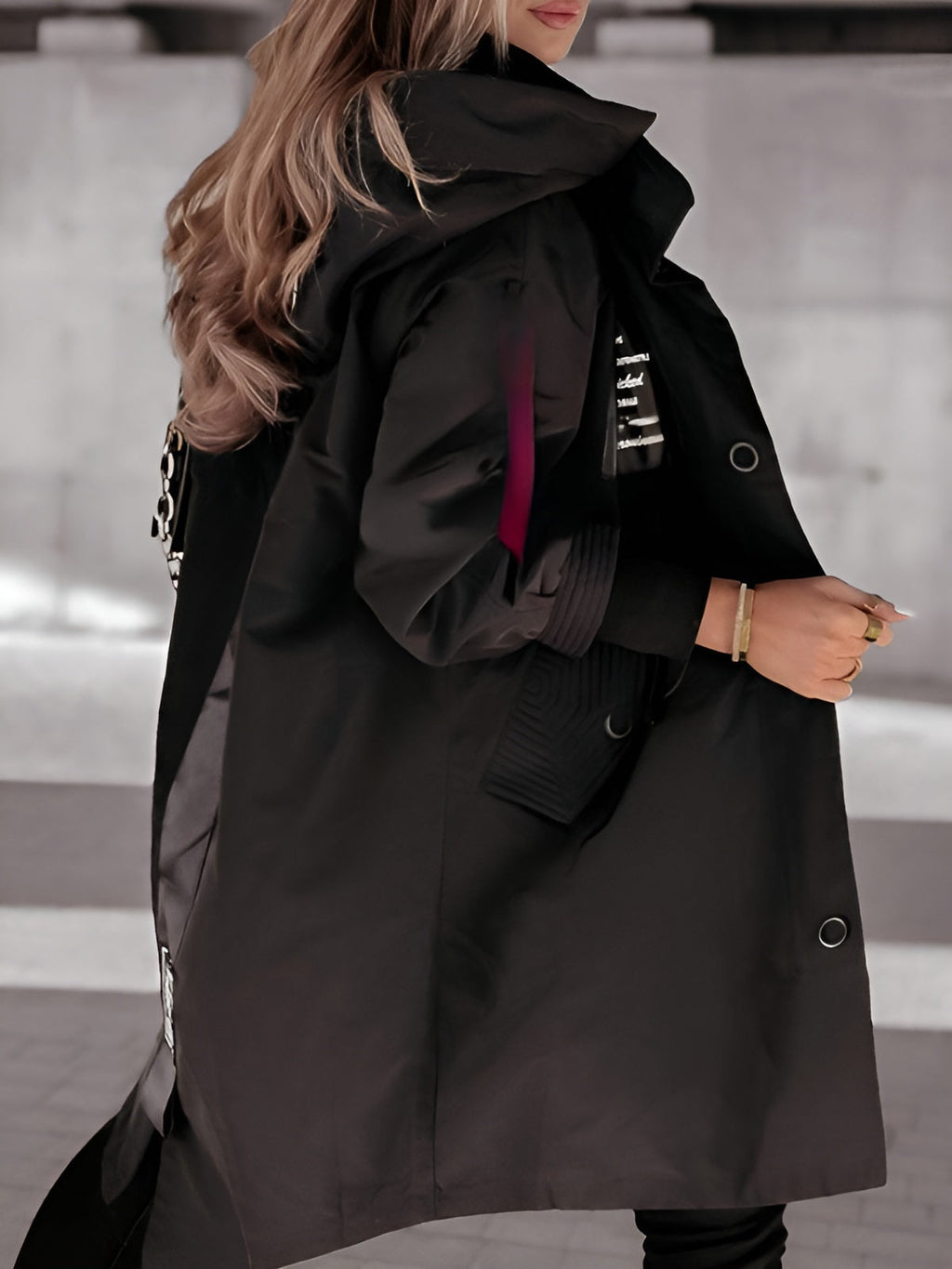 Women's oversized hooded windbreaker jacket with front pockets
