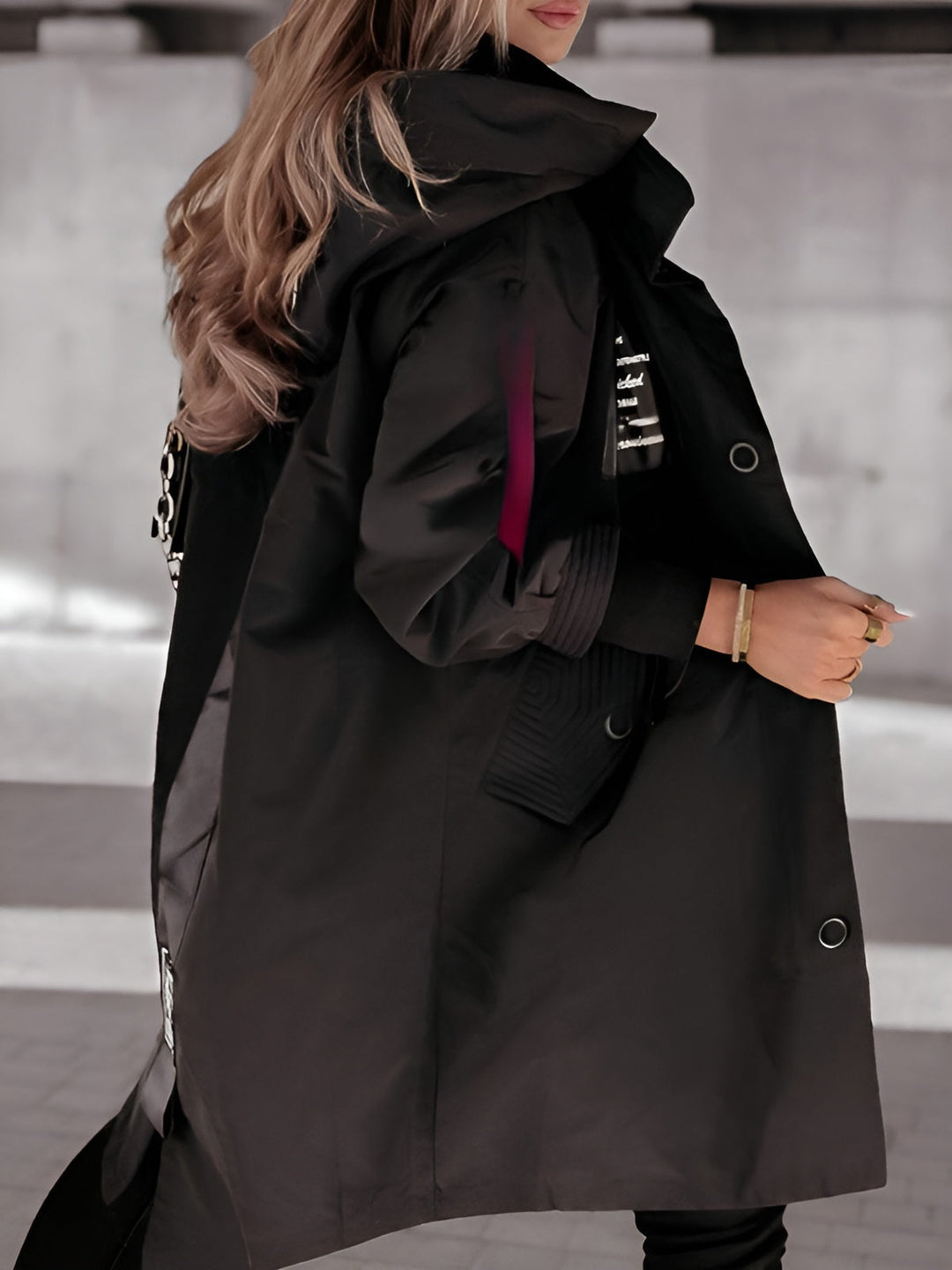 Women's oversized hooded windbreaker jacket with front pockets