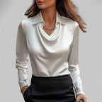 Women's long-sleeve blouse with draped neckline and pointed collar