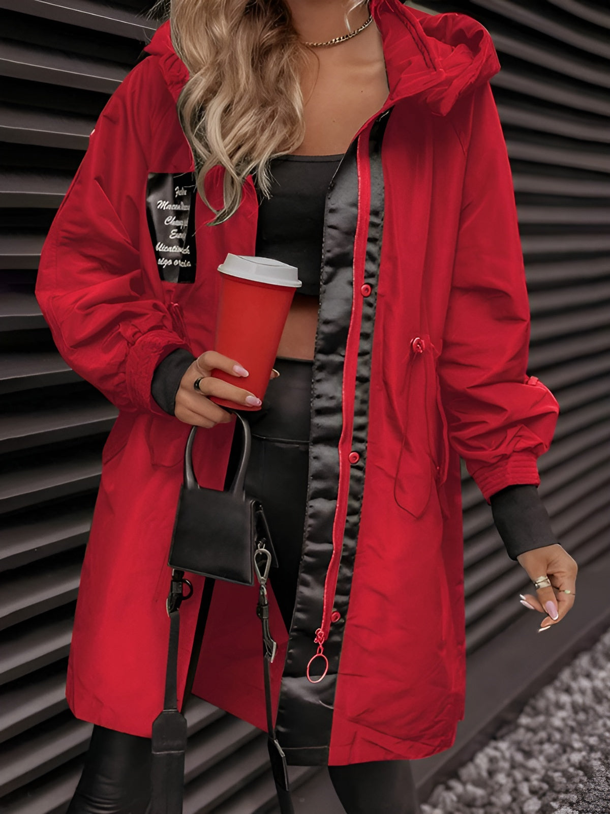 Women's oversized hooded windbreaker jacket with front pockets