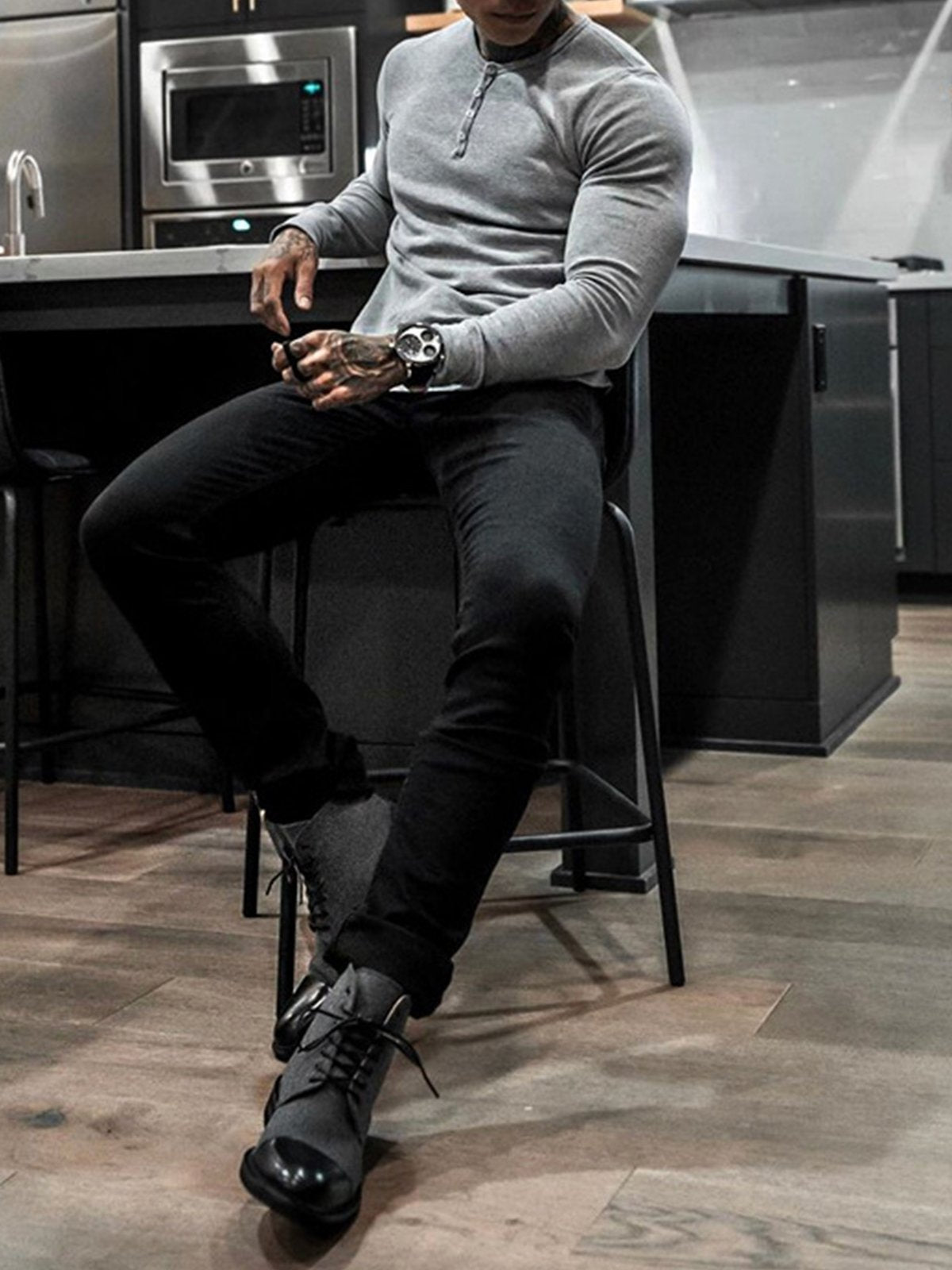 Men's ribbed henley sweater with long sleeves and button placket