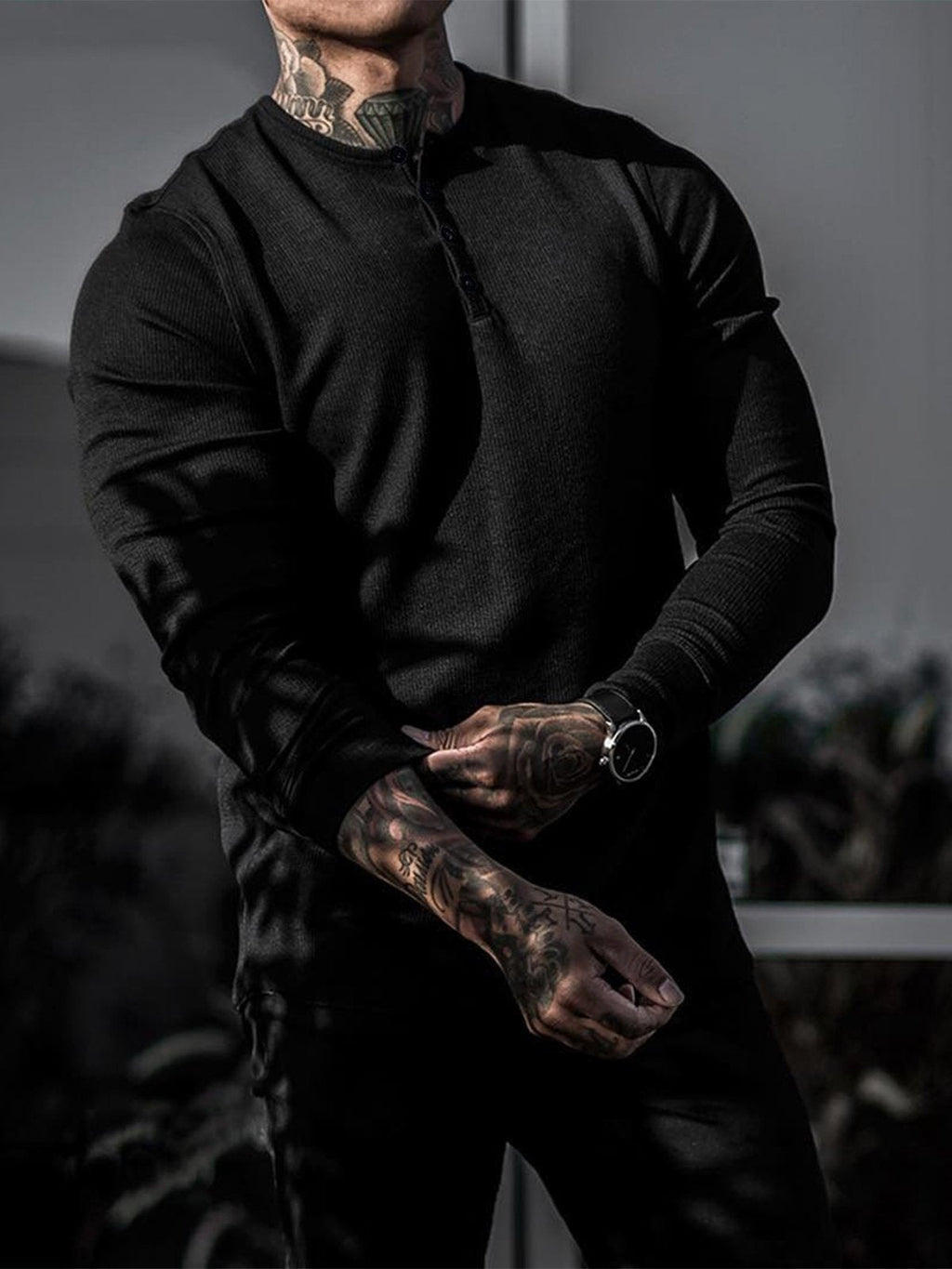 Men's ribbed henley sweater with long sleeves and button placket