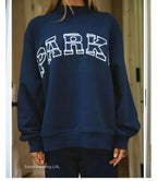 Women's oversized sweatshirt with mock neck, long sleeves and varsity lettering